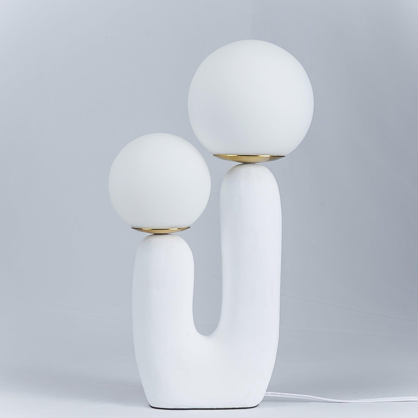 Corisande | Avantgarde rå skulpturel glas kugle bordlampe