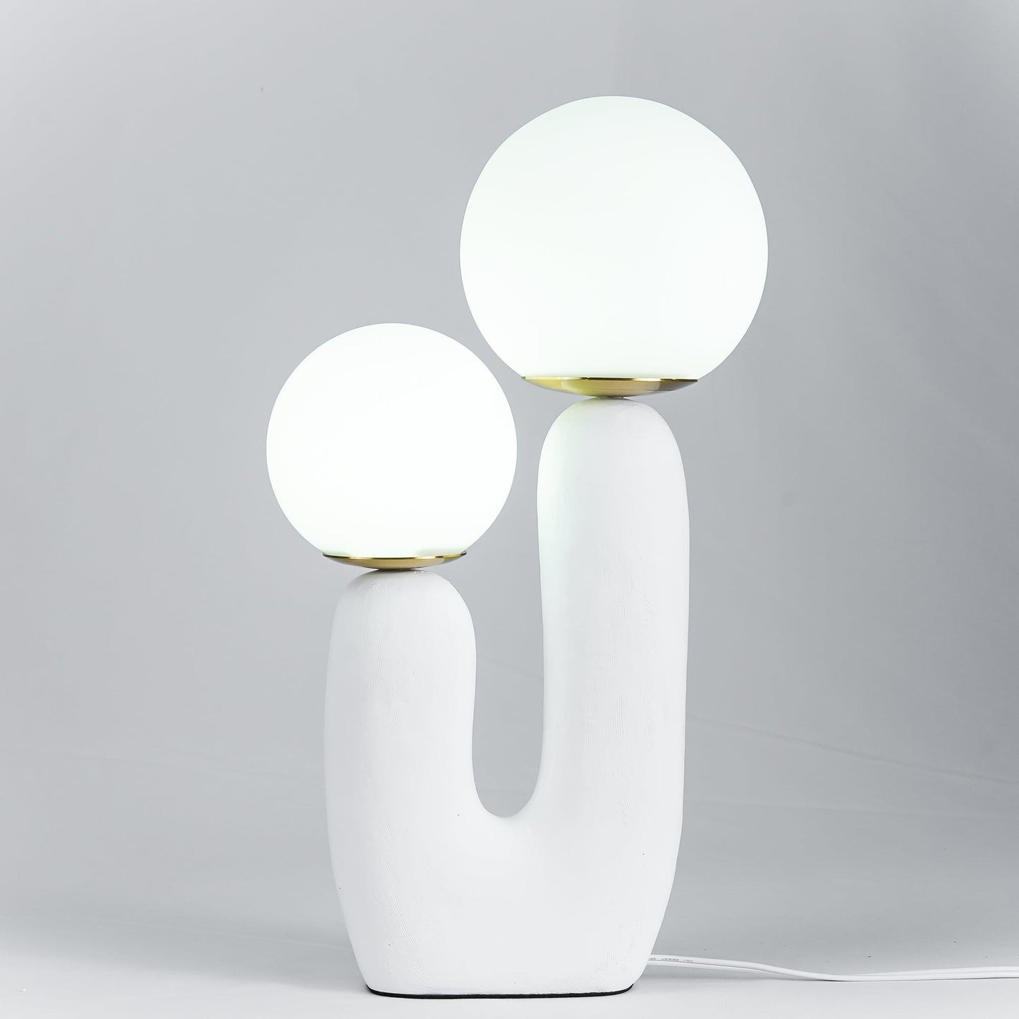 Corisande | Avantgarde rå skulpturel glas kugle bordlampe