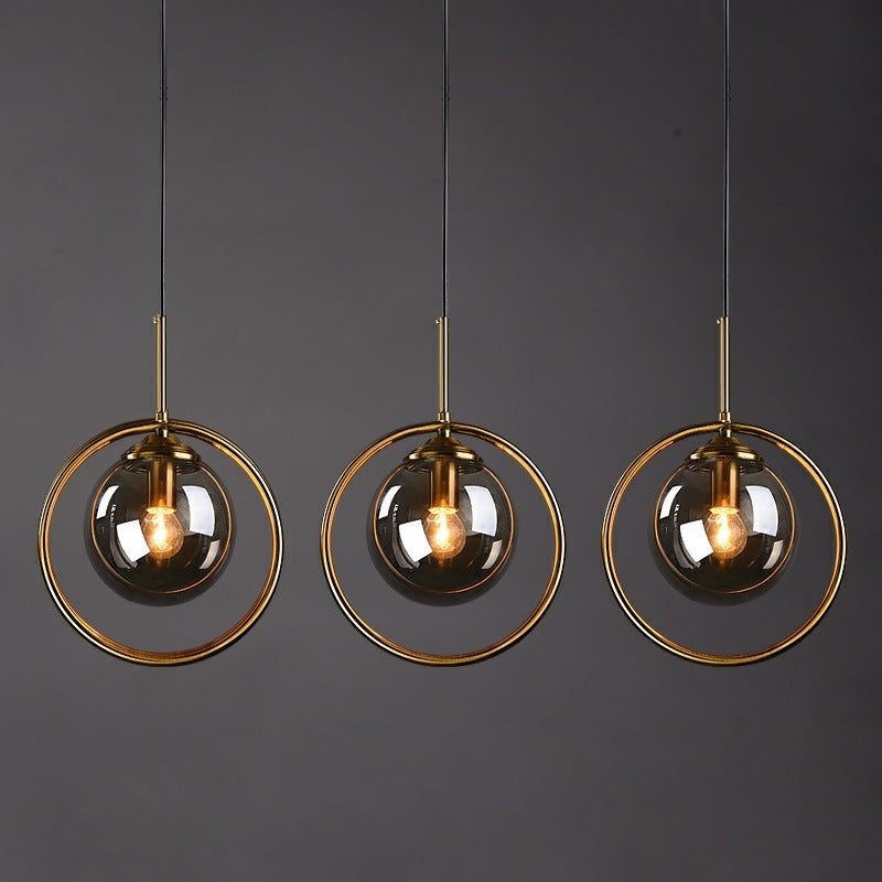 Luvie | Elegant glas kugle pendellampe med stilfuld metalring