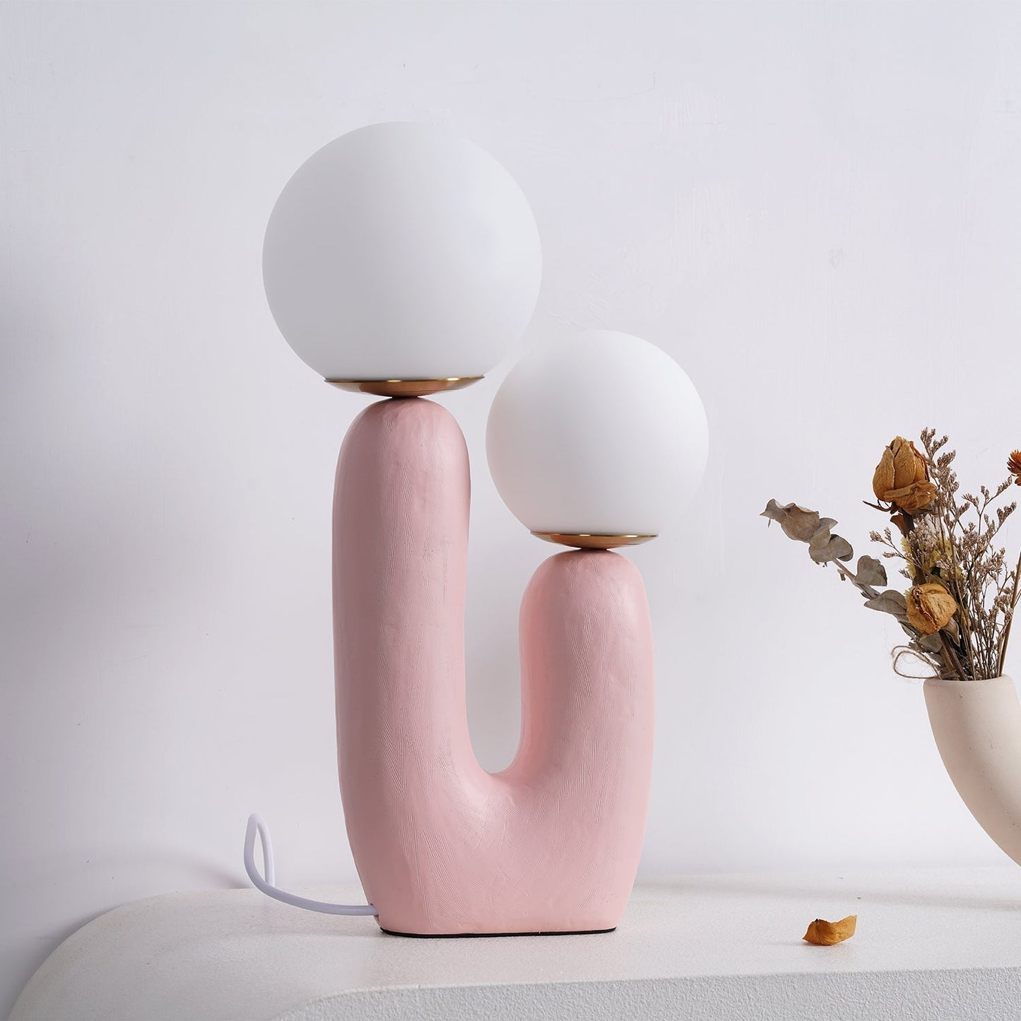 Corisande | Avantgarde rå skulpturel glas kugle bordlampe