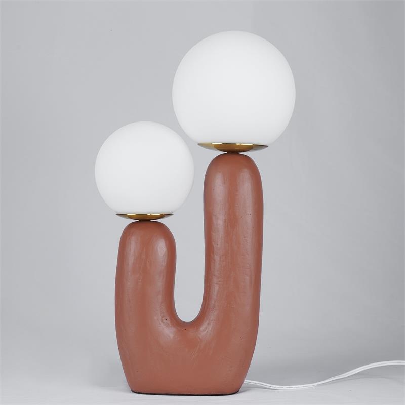Corisande | Avantgarde rå skulpturel glas kugle bordlampe