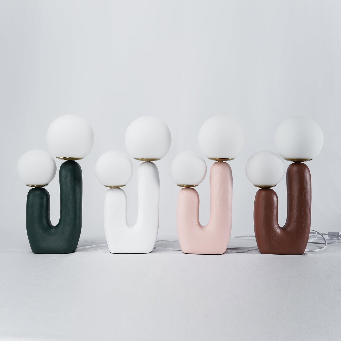Corisande | Avantgarde rå skulpturel glas kugle bordlampe